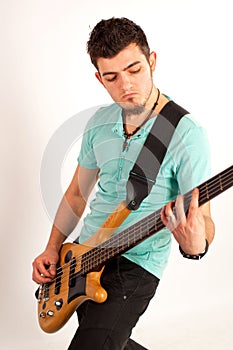 Young rocker with bass player with turquoise t shirt