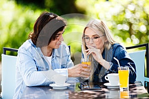 Young romantic couple spending time together - sitting in cafe`s