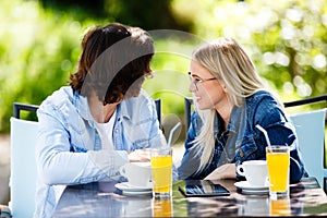 Young romantic couple spending time together - sitting in cafe`s