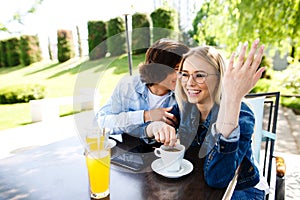Young romantic couple spending time together - sitting in cafe`s
