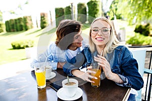 Young romantic couple spending time together - sitting in cafe`s