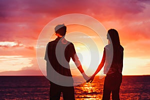 Young Romantic Couple at Sunset