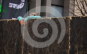 Young running lady trying to get over an obstacle