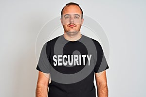 Young safeguard man wearing security uniform standing over isolated white background with a confident expression on smart face