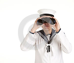 Young sailor with binoculars