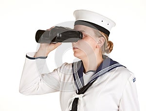 Young sailor with binoculars on white background