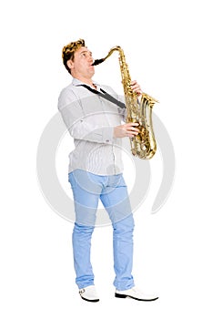Young saxophonist plays the saxophone