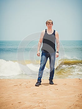 Young Scandinavian amid the Atlantic ocean in Iberia, West Africa