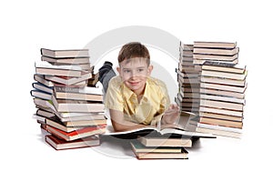 Young school boy reading books