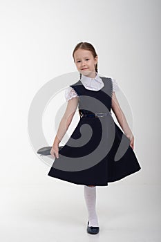 Young school girl ready for school. Little pupil is going to school. photo