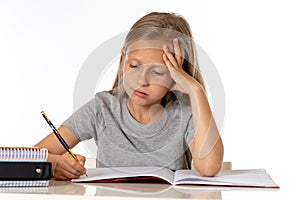 Young school student girl looking unhappy and tired in education concept