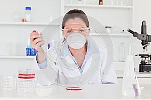 Young scientist preparing a sample