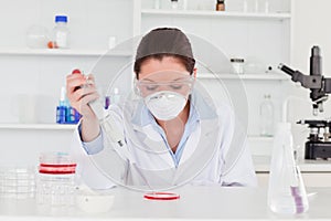 Young scientist preparing a sample