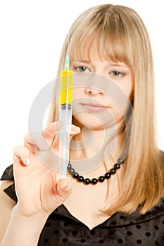 Young scientist with syringe