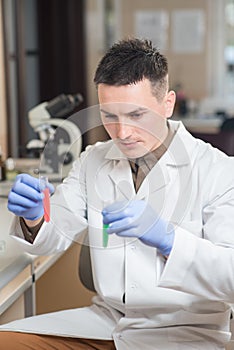 Young scientist working with liquid materials