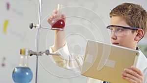 Young scientist works in laboratory