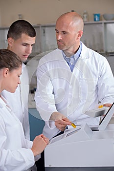 young scientist works in modern chemistry lab