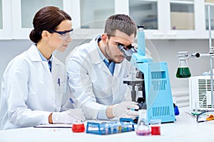 Young scientists making test or research in lab