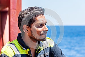 Young seafarer on the cargo ship.