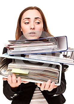 Young secretary in stressed with a ton of documents photo