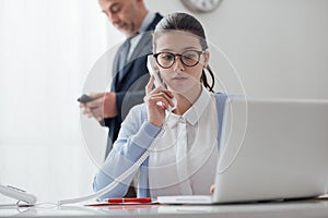 Young secretary at work