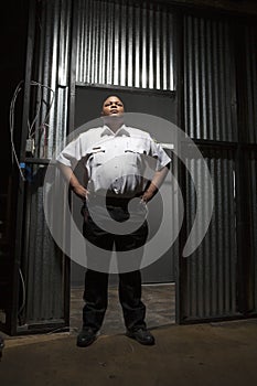 Young Security Guard At Doorway