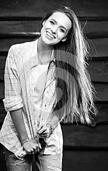 Young sensual & beauty brunette woman pose on wooden background. Black-white photo