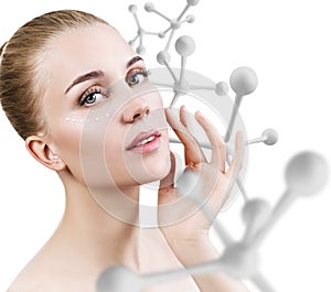 Young sensual woman with big white molecule chain.