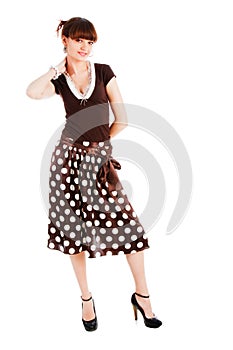 Young sensuality beautiful girl in spotted skirt
