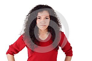 Young serious angry woman portrait on a white background