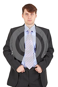 Young serious businessman on white background