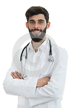 Young serious handsome bearded doctor with white coat and stethoscope.