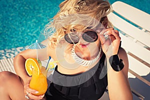 Young woman drinking cocktail