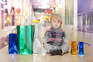 Young shopoholic in the mall