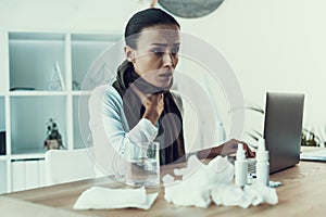 Young Sick Woman in White Shirt Sitting in Office.