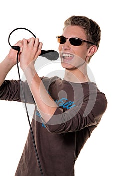 Young singer with a microphone during