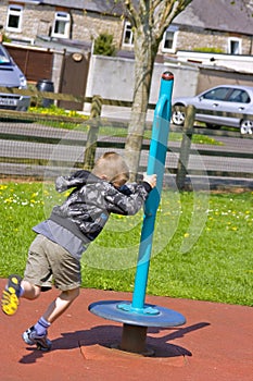 Young six year old boy playing