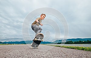 Young skateboarder make a tricks with skateboard