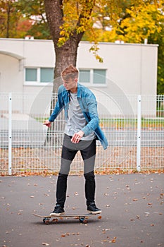 A young skateboarder practicing in a skate park.