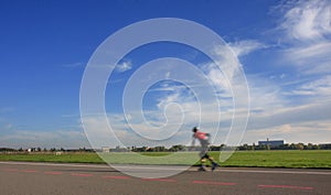 Young skater boy riding on roller skates