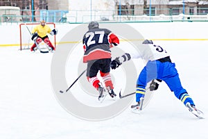 Young skater man in attack. Ice hockey game