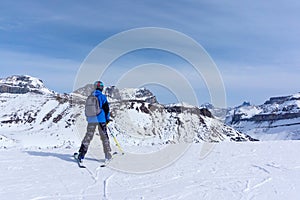 Young Skier on Mountain Edge at Lake Louise in the Canadian Rockies