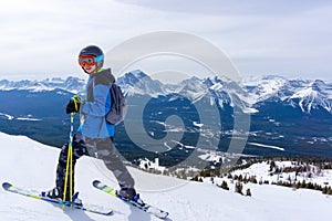 Young Skier on Mountain Edge at Lake Louise in the Canadian Rockies