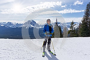 Young Skier on Mountain Edge at Lake Louise in the Canadian Rockies