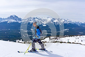 Young Skier on Mountain Edge at Lake Louise in the Canadian Rockies