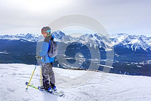 Young Skier on Mountain Edge at Lake Louise in the Canadian Rockies