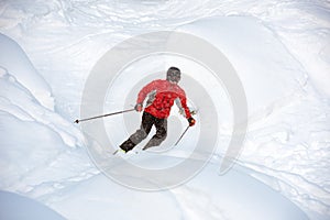 Young skier off-piste backcountry freeride photo