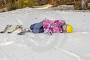 young skier is resting on a ski slope. Active recreation. Healthy