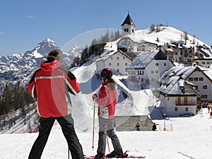 Young skiers viewing panorama