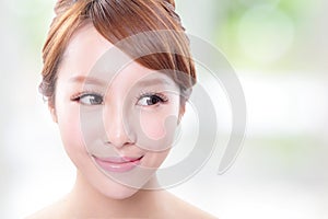Young skin care woman look empty copy space